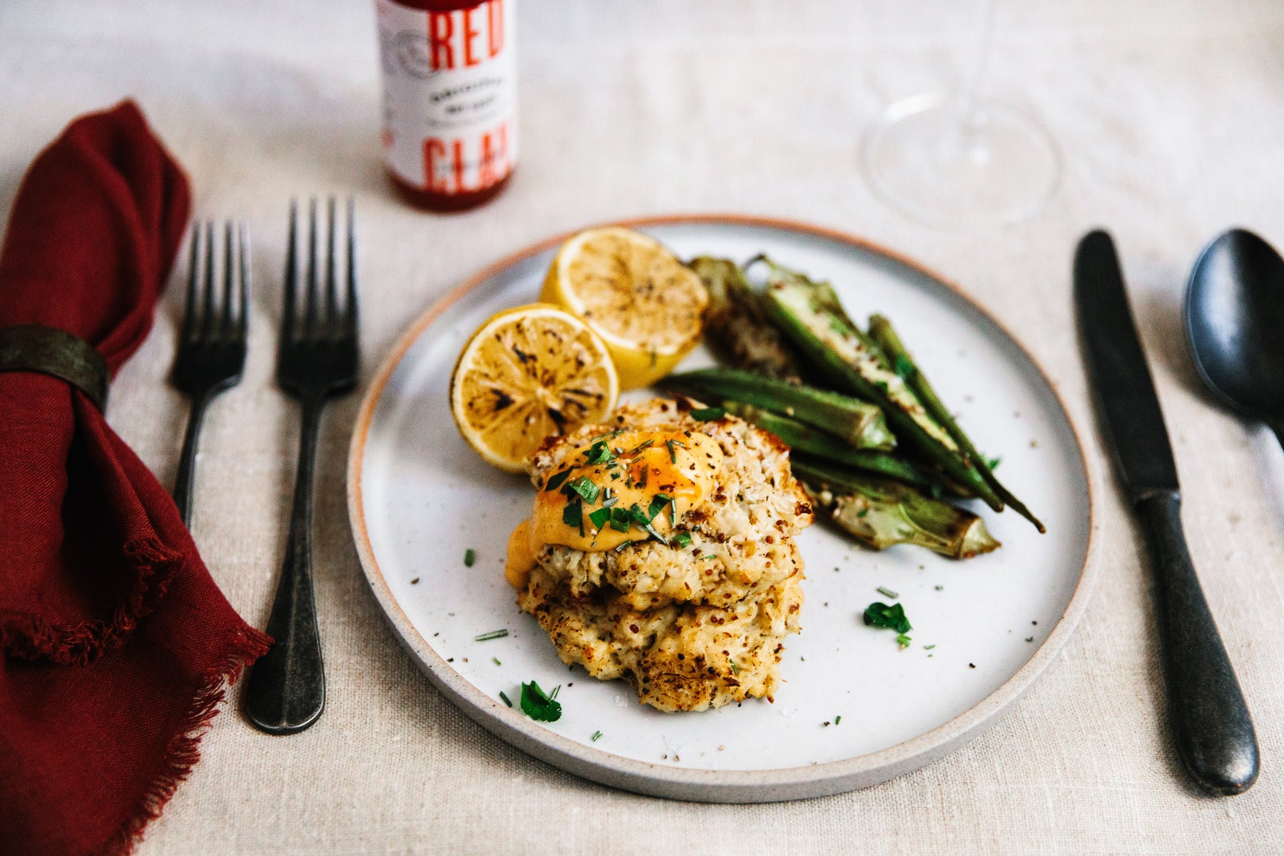 Baked Crab-cake with Blistered Okra, Grilled Lemon, and Red Clay Aioli