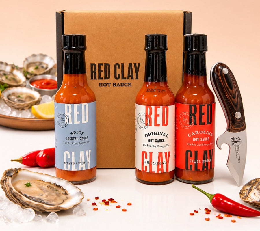Red Clay Oyster Trio gift box with Spicy Cocktail Sauce, Original Hot Sauce, Carolina Hot Sauce, and a Middleton Made oyster knife